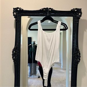 NAKED WARDROBE WHITE TANK BODYSUIT SIZE MEDIUM
